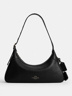 Coach Small Shoulder Bag with a charm included